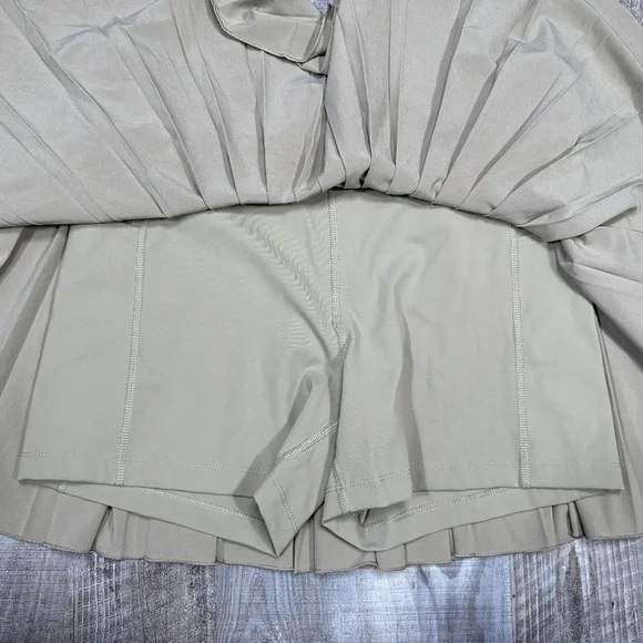 Aritizia TnAction TnaMove Tennis ProMicro pleated high rise Skirt Tan Size L - Picture 7 of 10
